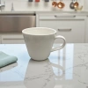 White ceramic mug for home use, simple and high-quality appearance, heat-resistant and anti-scald details Picture